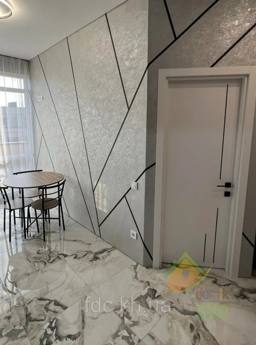 Межкомнатная дверь OMEGA / INDUSTRIAL WM42 эмлеер белый, черный молдинг